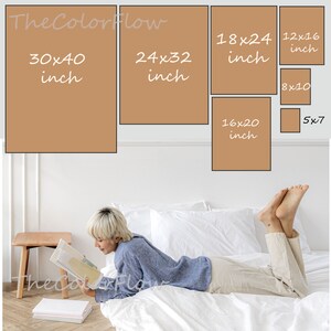May include: A woman is lying on a bed reading a book. The image shows different sizes of frames in inches, including 30x40, 24x32, 18x24, 16x20, 12x16, 8x10, and 5x7.
