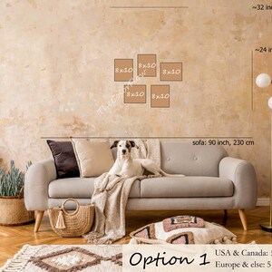May include: A living room interior design with a gray sofa, a white dog, a gold floor lamp, and a shelf with decorative items. The wall is beige and has a gallery wall of five 8x10 inch frames. The text "Option 1" is visible in the bottom right corner of the image. USA & Canada: 5 x 8x10 inch. Europe & else: 5 x A4 (21x29.7 cm).