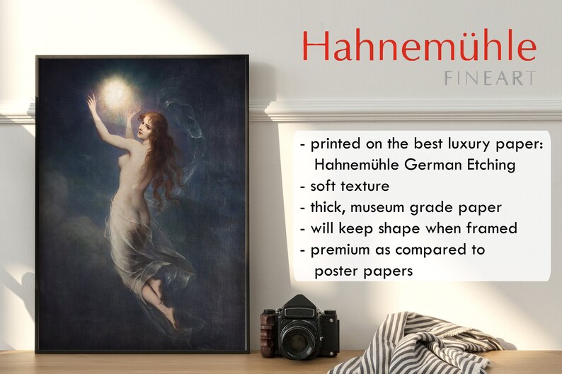 May include: A framed print of a woman reaching up to touch a glowing orb in a dark sky. The print is on Hahnem&uuml;hle German Etching paper, which is known for its soft texture and museum-grade quality.