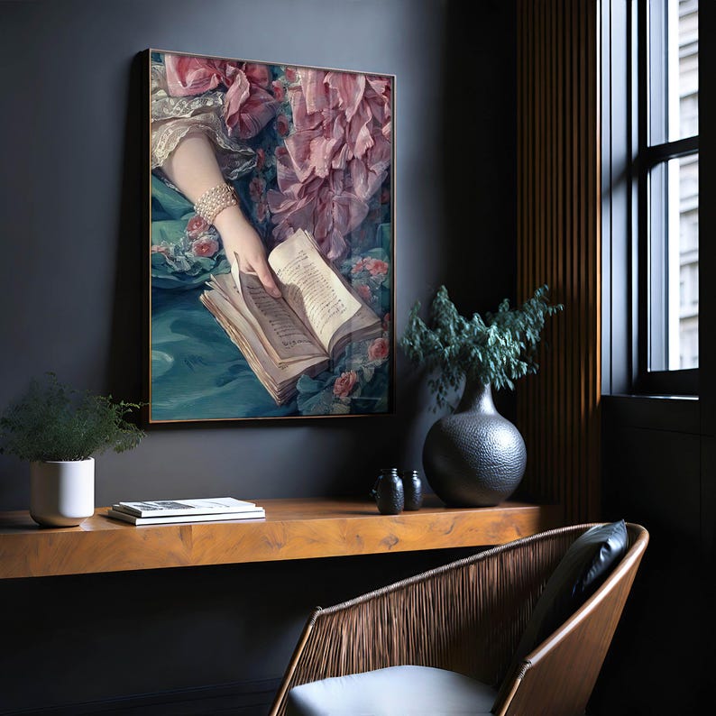 a painting of a woman reading a book, with a wooden shelf below it and a wicker chair in the foreground.