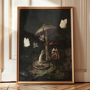 The image is a framed painting depicting a mushroom, butterflies, and a frog in a natural setting.
