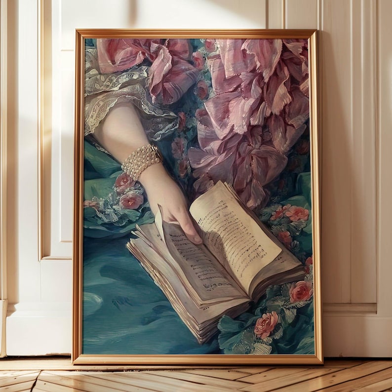 A framed painting depicting a woman's hand holding an open book, surrounded by a floral background.