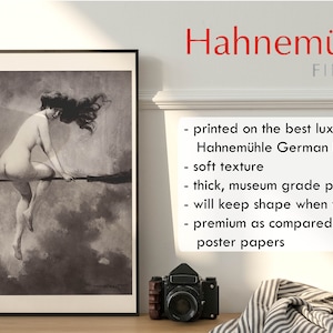 May include: A black and white print of a woman riding a broomstick. The print is framed and hanging on a wall. The text "Hahnem&uuml;hle FINEART" is visible in the upper right corner of the image. The text below the title describes the paper used for the print: "printed on the best luxury paper: Hahnem&uuml;hle German Etching soft texture thick, museum grade paper will keep shape when framed premium as compared to poster papers"