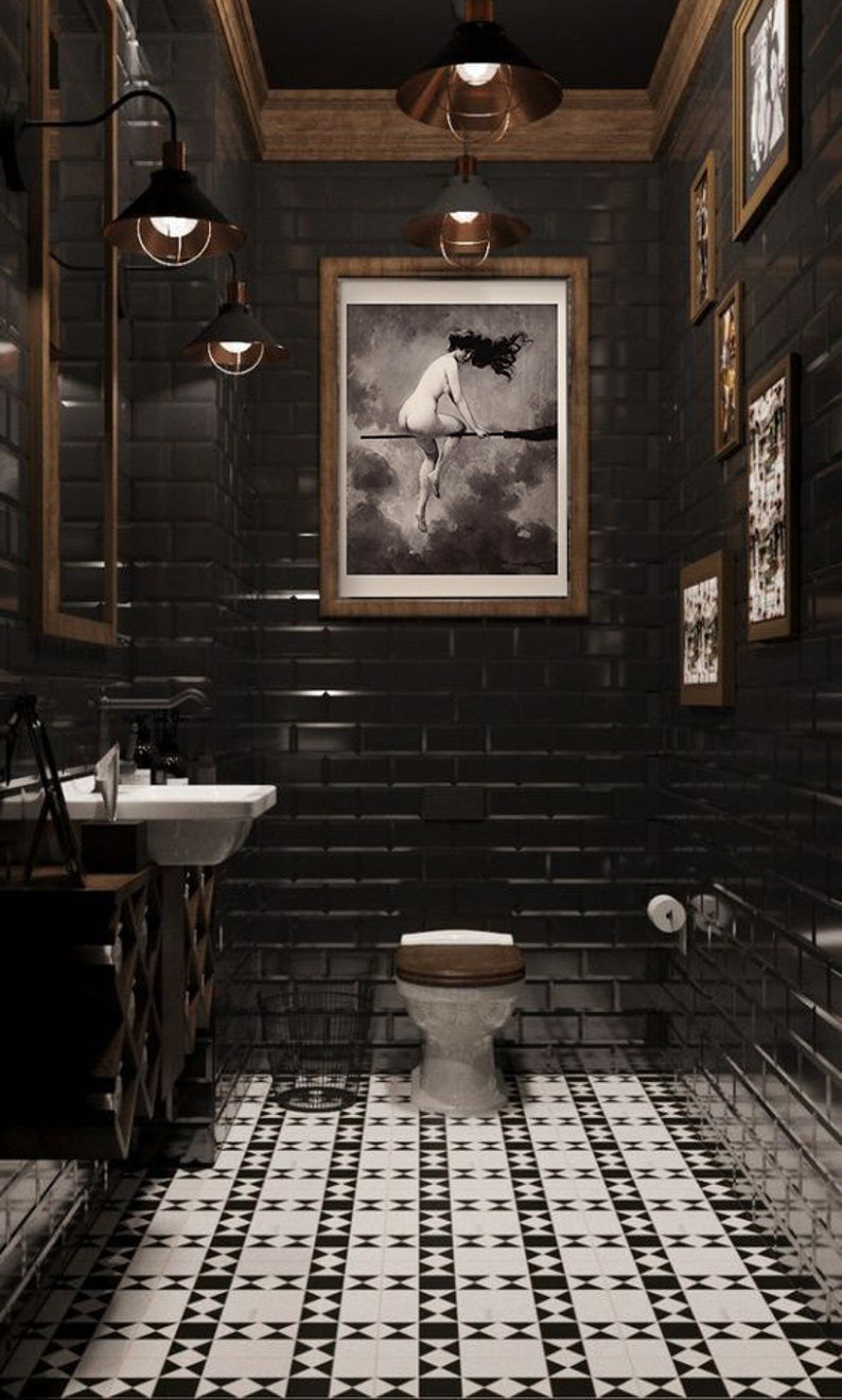 May include: A black and white checkered tile floor in a bathroom with a black tiled wall, a toilet, and a framed picture of a woman on a broomstick.