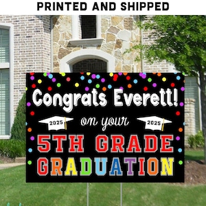 May include: Black and white yard sign with colorful confetti and text that reads "Congrats Everett! on your 5th GRADE GRADUATION 2025".
