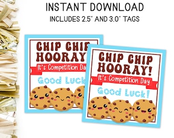 May include: Two blue and white printable gift tags with the text "Chip Chip Hooray! It's Competition Day. Good Luck!" and a cartoon image of three chocolate chip cookies with faces. The tags are available in 2.5 and 3.0 inch sizes.