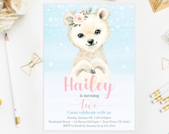 May include: A blue and white invitation with a watercolor illustration of a polar bear wearing a pink flower crown. The text reads "Hailey is turning two. Come celebrate with us. Sunday, January 5th 1:00-3:00pm Penelope's House 44 Snowy Owl Lane Your Town, US 12345 RSVP to Sarah by January 1st at 555-5555".
