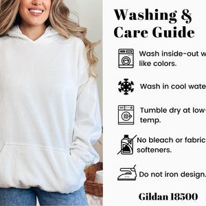May include: A white hooded sweatshirt with a front pocket. The image includes a washing and care guide with instructions: wash inside-out with like colors, wash in cool water, tumble dry at low-temp, no bleach or fabric softeners, and do not iron design. The brand is Gildan 18500.