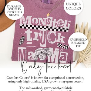 May include: A mauve Comfort Colors t-shirt with the words "Monster Truck Mama" in a bold, playful font. The design includes a monster truck graphic and checkered flag accents. The shirt has a relaxed fit and durable double-stitched seams.