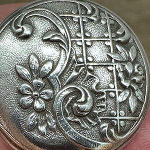 Edwardian silver flower locket, c1910