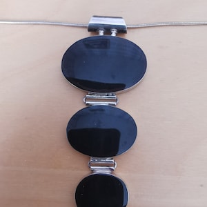 silver 3 tier pendant with black resin inlay