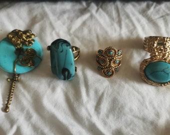4 turquoise coloured bead scarf rings