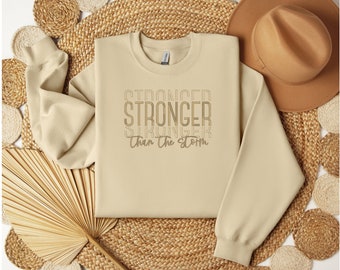 Stronger Than The Storm Embroidered Sweatshirt/ Mother’s Day Gift/ Unisex Sweatshirt/ Inspirational Apparel/ Cancer Survivor Sweatshirt Gift
