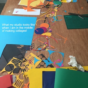 May include: A table covered in colorful paper scraps, including circles, squares, and rectangles, with a note that reads "What my studio looks like when I am in the middle of making collages!"
