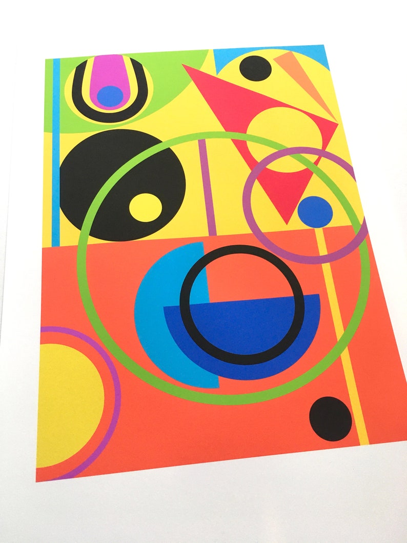 May include: Abstract geometric art print with a colorful design featuring circles, semi-circles, triangles, and squares in shades of yellow, red, green, blue, black, and purple.