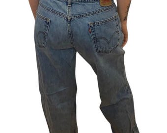Vintage Levis 550 jeans, Levi denim pants, blue wash jeans, 90s denim, wide leg denim, baggy jeans, size W36 L32, 100% cotton, relaxed fit