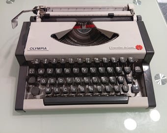 Machine à écrire vintage - Olympia Traveler de Luxe. Blanche