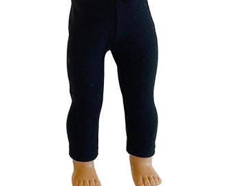 May include: Black leggings. The leggings are made of a soft, stretchy material. The leggings are designed to fit a doll.
