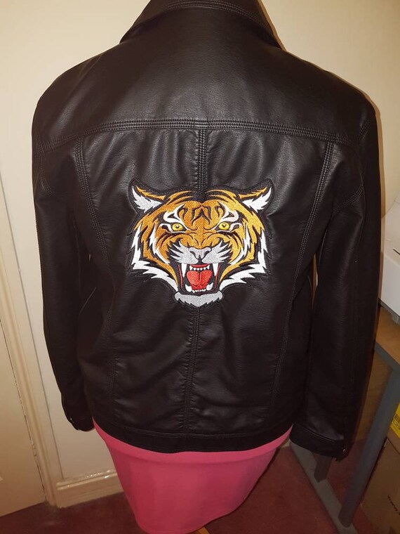 leather jacket with tiger on the back