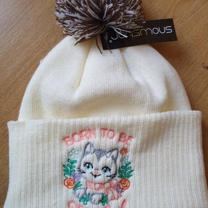 Cream bobble hat with cute kitsch retro embroidered cat born to be mild made to order