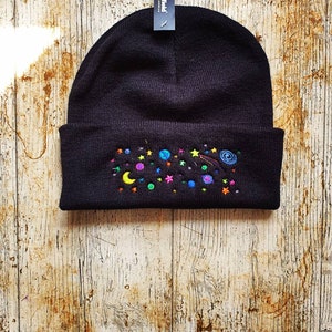 Galactic space celestial winter embroidered black bobble / beanie hat cosmic science geek stars moon earth