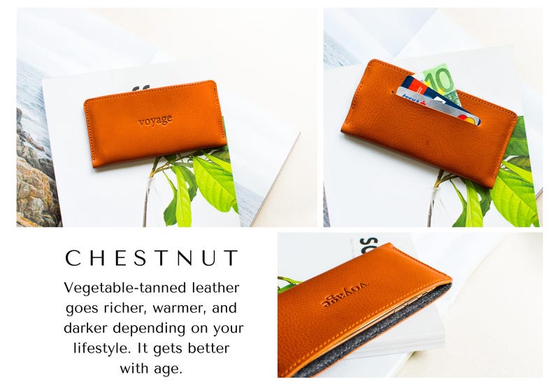 May include: Chestnut-colored leather wallet with the word "voyage" embossed on the front. The wallet is shown with cards and cash inside. The wallet is made of vegetable-tanned leather.
