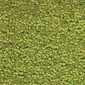 May include: Close-up of a pile of small, cylindrical, olive-green seed beads. The beads are uniform in size and shape, with a hole running through the center of each. Ideal for jewelry making and crafting projects.