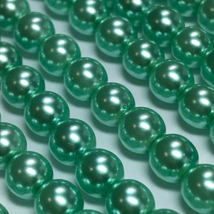 75 6mm aqua round glass pearls