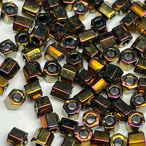 Miyuki #11C-9615, 11/0 Hex metallic gold iris, 2-cut,  20 gms