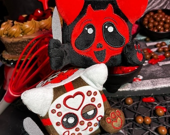 BOTH sweet and scary Black Cherry GhostPuss and Black Forest Friday cube shaped horror cat plushies by Squaredy Cats