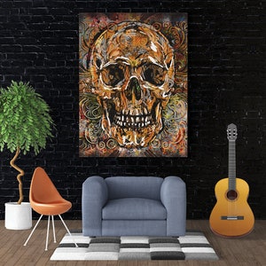 May include: A colorful abstract painting of a skull with intricate details and swirling patterns. The skull is painted in shades of gold, brown, and black, and the background is a mix of vibrant colors.