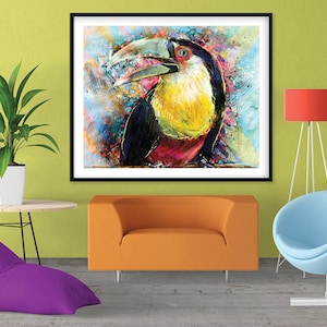 May include: A colorful abstract painting of a toucan with a large orange beak and yellow and red feathers. The painting is framed in black and set against a green wall.