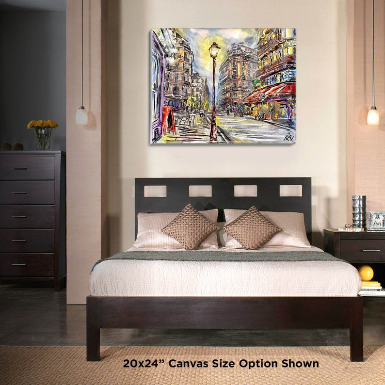 Pode incluir: Uma pintura que representa uma cena de rua em Paris, Fran&ccedil;a. A pintura &eacute; feita em um estilo colorido e impressionista. A rua &eacute; ladeada por edif&iacute;cios, e h&aacute; pessoas caminhando e comprando. A pintura &eacute; emoldurada e pronta para ser pendurada.