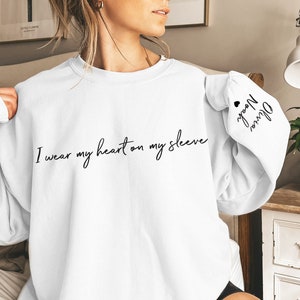 I Wear My Heart On My Sleeve Sweatshirt, Mothers Day Shirt, Mama Sweatshirt with Kids Name on Sleeve, Personalized Mother Day Gift for Mom