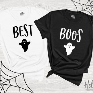 May include: Two black and white t-shirts with a ghost graphic and the text "Best" and "Boo's".