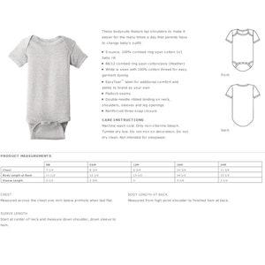 May include: A size chart for baby onesies, showing measurements in inches for chest, body length at back, and sleeve length. The chart includes sizes from newborn to 24 months.