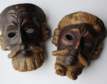 Pair of wooden South American masks