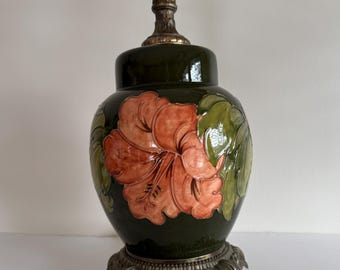 Moorcroft dark green background with hibiscus flower pattern table lamp