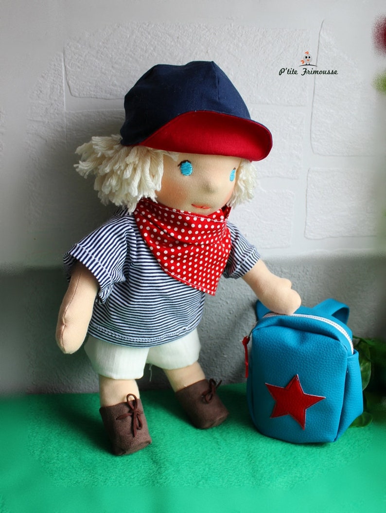 poupee theo
