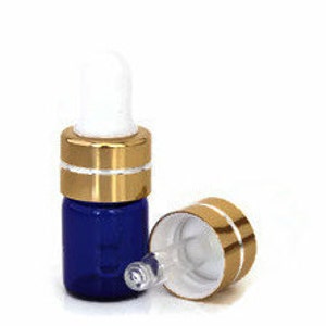 May include: A blue glass bottle with a gold lid and a white dropper. The bottle is filled with a clear liquid.