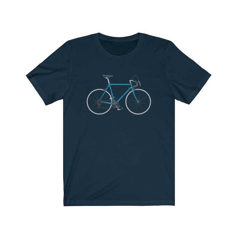 May include: A navy blue t-shirt with a graphic of a blue bicycle.