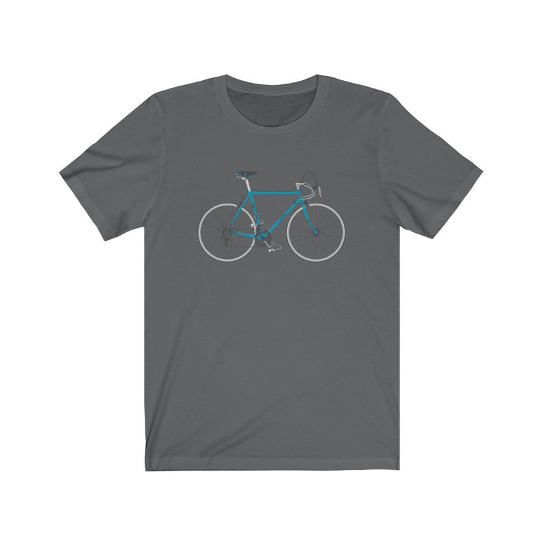 May include: A dark gray t-shirt with a blue bicycle graphic printed on the front.