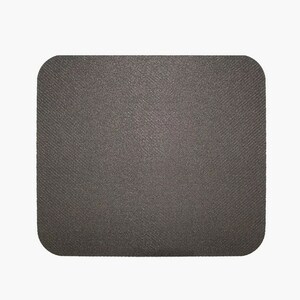 May include: A dark gray mouse pad with a textured surface.