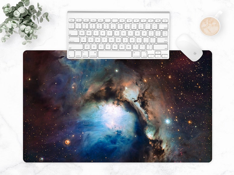 May include: A dark blue and purple nebula with a bright white center, surrounded by a field of twinkling stars. This image is perfect for a desktop background or a space-themed print.