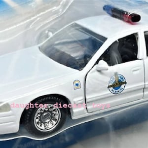 Voiture de police de la PATROL D&#39;ÉTAT DU NEBRASKA - Ford Crown Victoria - État neuf/scellée en usine ! Road Champs : le cadeau parfait pour votre officier !