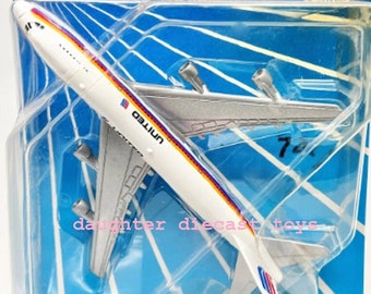 Vintage 1987 UNITED AIRLINES 747 Hard to find Jet Airplane,  Diecast Metal Pristine Condition / Factory Sealed! Ertl-Perfect gift!