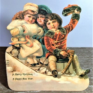 VICTORIAN CHRISTMAS DECORATION Children Sledding Standing Display Greeting Card Rare Mint/Sealed Merrimack image 2