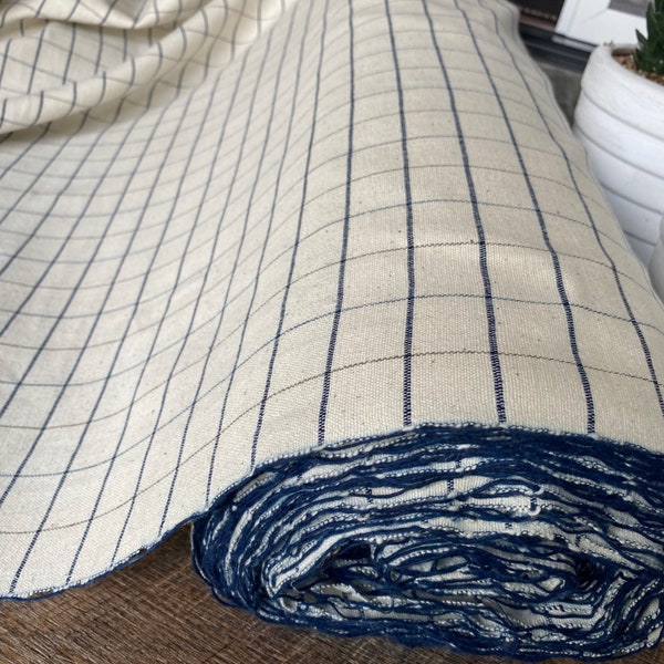 Indigo and a bit brown thread ,The Chiang Mai handwoven cotton fabric, natural  cotton, soft  cotton and slight pattern  , sell by the yards