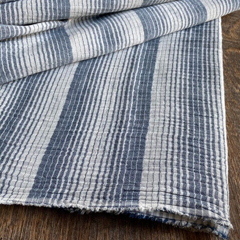 cotton woven soft cotton and slight pattern sell by the yards The Chiangmai native cotton fabric cotton grey blue shade and white