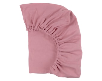 Drap-housse KraftKids en mousseline rose. pour matelas 120 x 60 cm, adapté. pour matelas 140 x 70 cm, adapté. pour matelas 90 x 200 cm